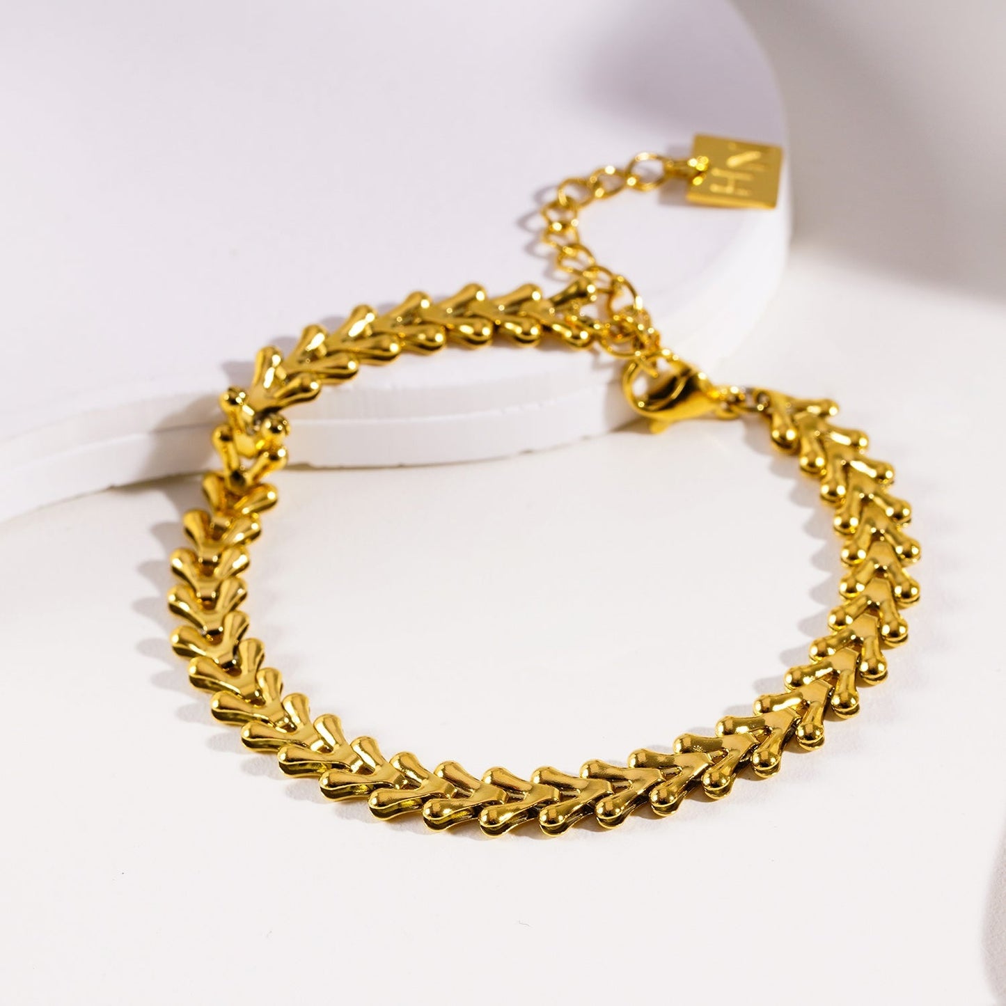 BLYTH: Vintage-Inspired Linked Abstract Crest Bracelet - Velora Luxury Fashion