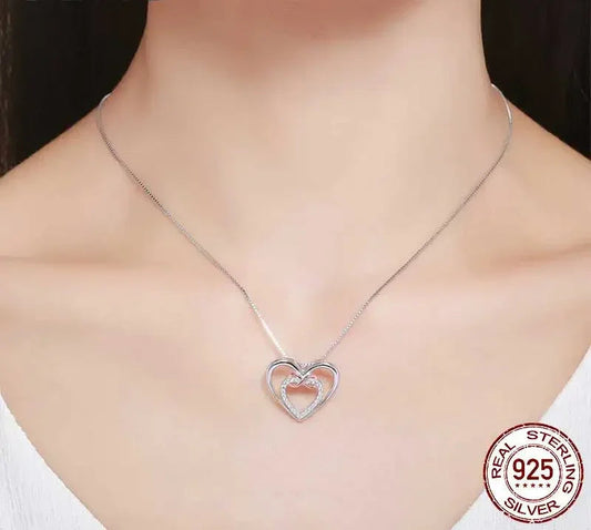 Entwined Hearts: Sterling Silver Infinity Necklace With Double Hearts - Velora Luxury Fashion