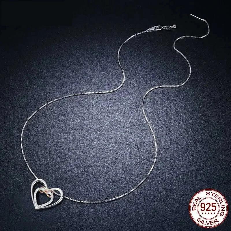 Entwined Hearts: Sterling Silver Infinity Necklace With Double Hearts - Velora Luxury Fashion
