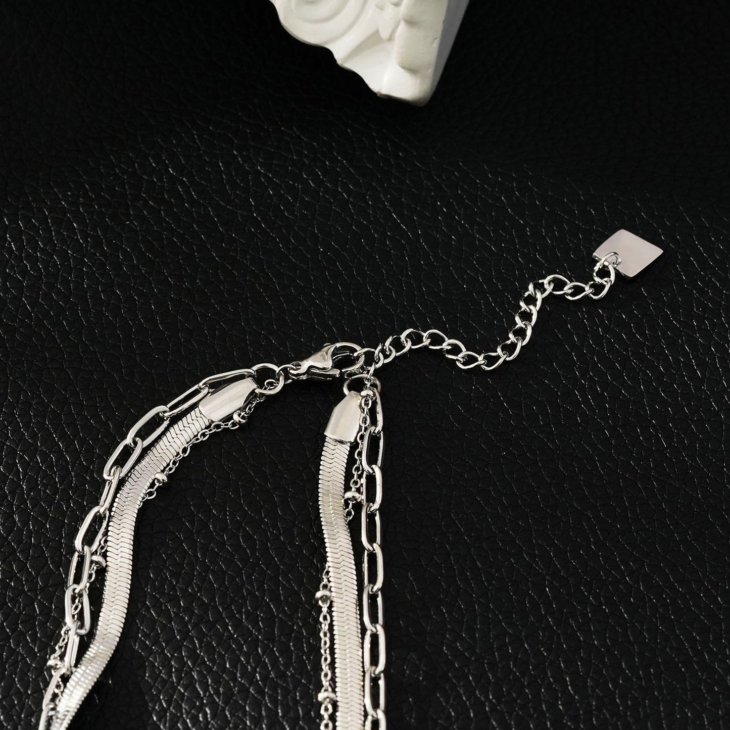 GEILNAR: Triple Layer Mixed-Chain Necklace in Silver - Velora Luxury Fashion