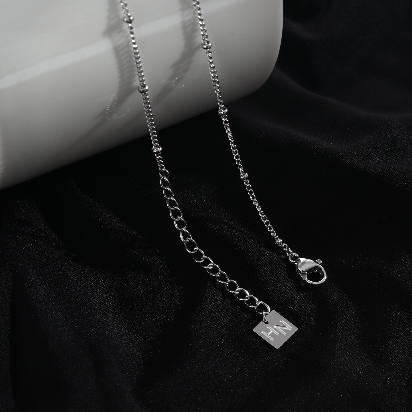 LERATI Beaded Chain with an Encased Fresh Water Pearl Pendant in Silver - Velora Luxury Fashion