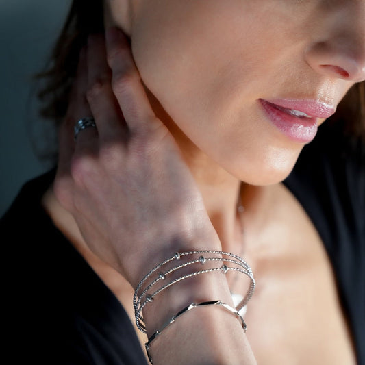 Style FARZIKA Silver: Triple Stacked Textured Beaded Bracelet - Velora Luxury Fashion