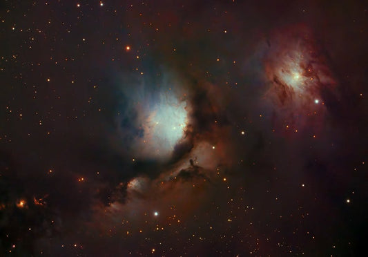 Explore the mesmerizing beauty of the Orion Nebula with this captivating deep space photograph.