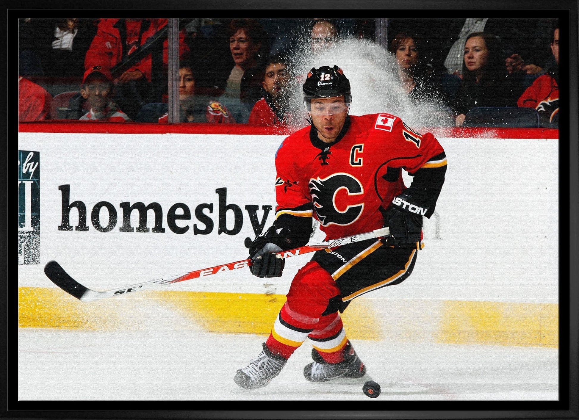 Jarome Iginla 20x29 Framed Canvas Flames Skating-H Frameworth Sports Marketing