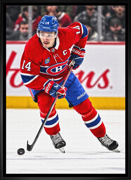 Nick Suzuki Framed 20x29 Canvas Canadiens Action-H Frameworth Sports Marketing
