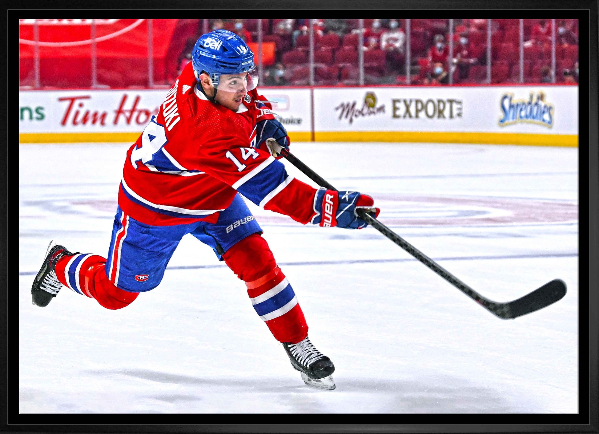 Nick Suzuki Montreal Canadiens Framed 20x29 Shooting Follow Through Canvas Frameworth Sports Marketing