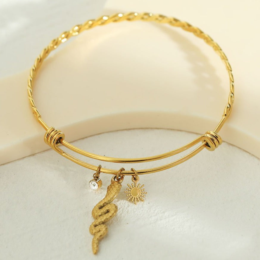 CATALINA Gold: Bracelet with Serpent, Sun Symbol and Zirconia (CZ) Charms - Velora Luxury Fashion