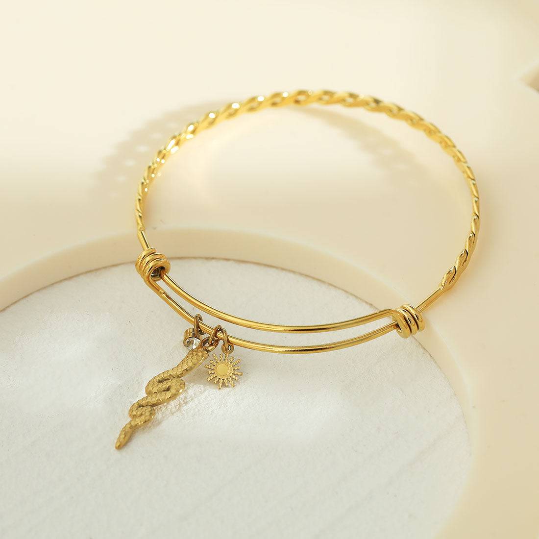CATALINA Gold: Bracelet with Serpent, Sun Symbol and Zirconia (CZ) Charms - Velora Luxury Fashion