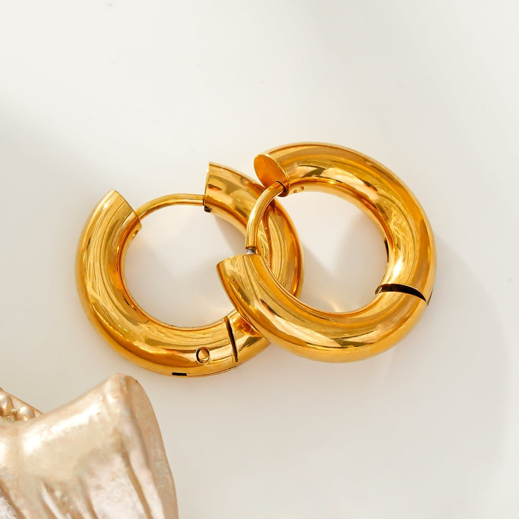 CHOLULA: Mid Width Smooth Surface Tube Hoop Earrings in Gold - Velora Luxury Fashion