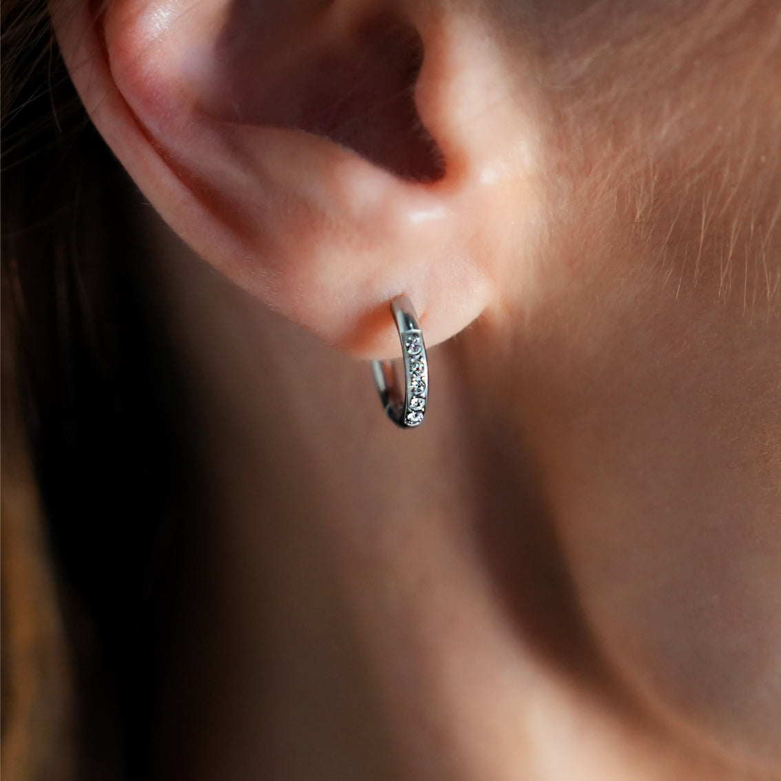 DARCI: Pavé Zirconia Gemstone Embedded Classic Mini Hoop in Silver - Velora Luxury Fashion