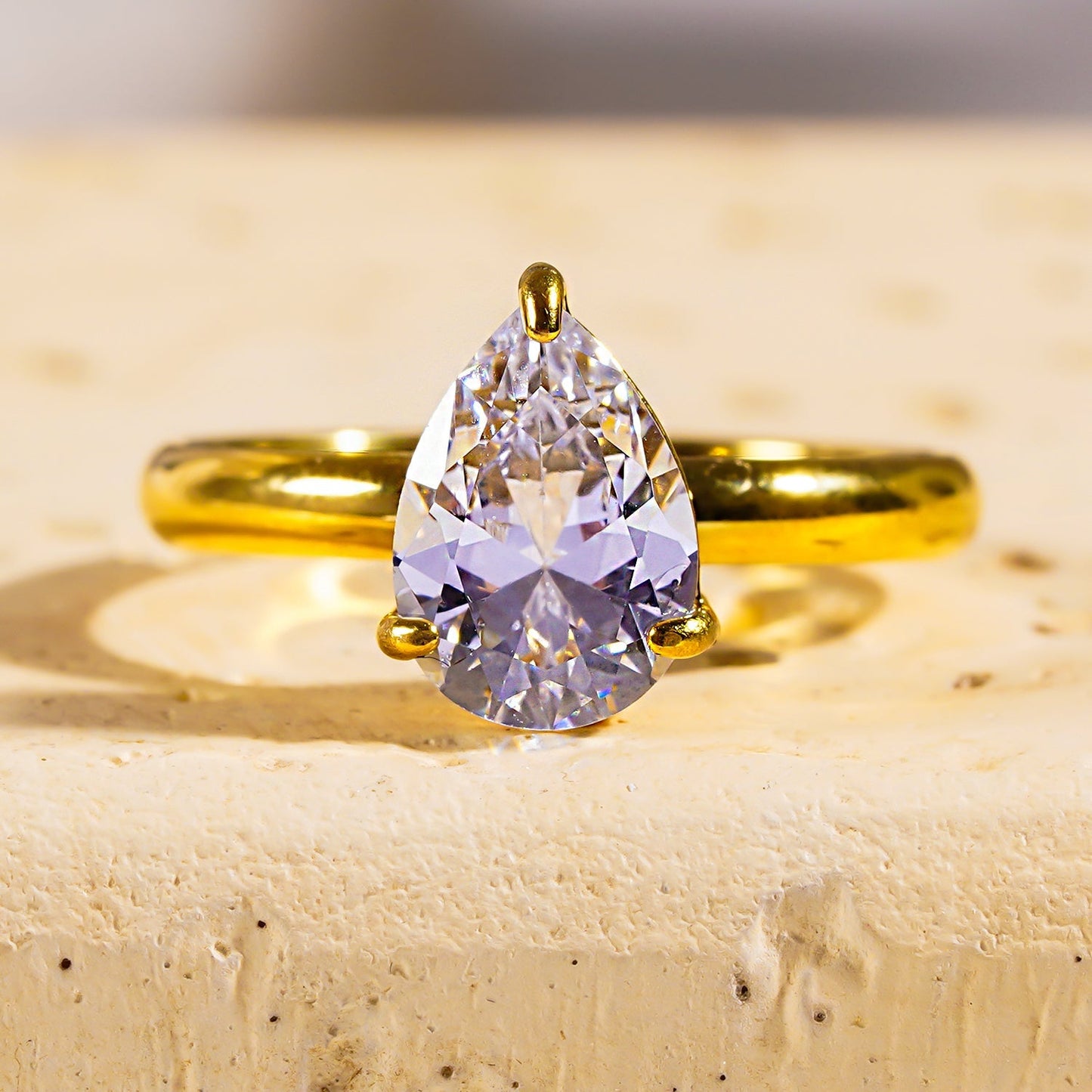 DIMONDA: Classic Gold Ring with Prominent Teardrop Zirconia Centerpiece - Velora Luxury Fashion