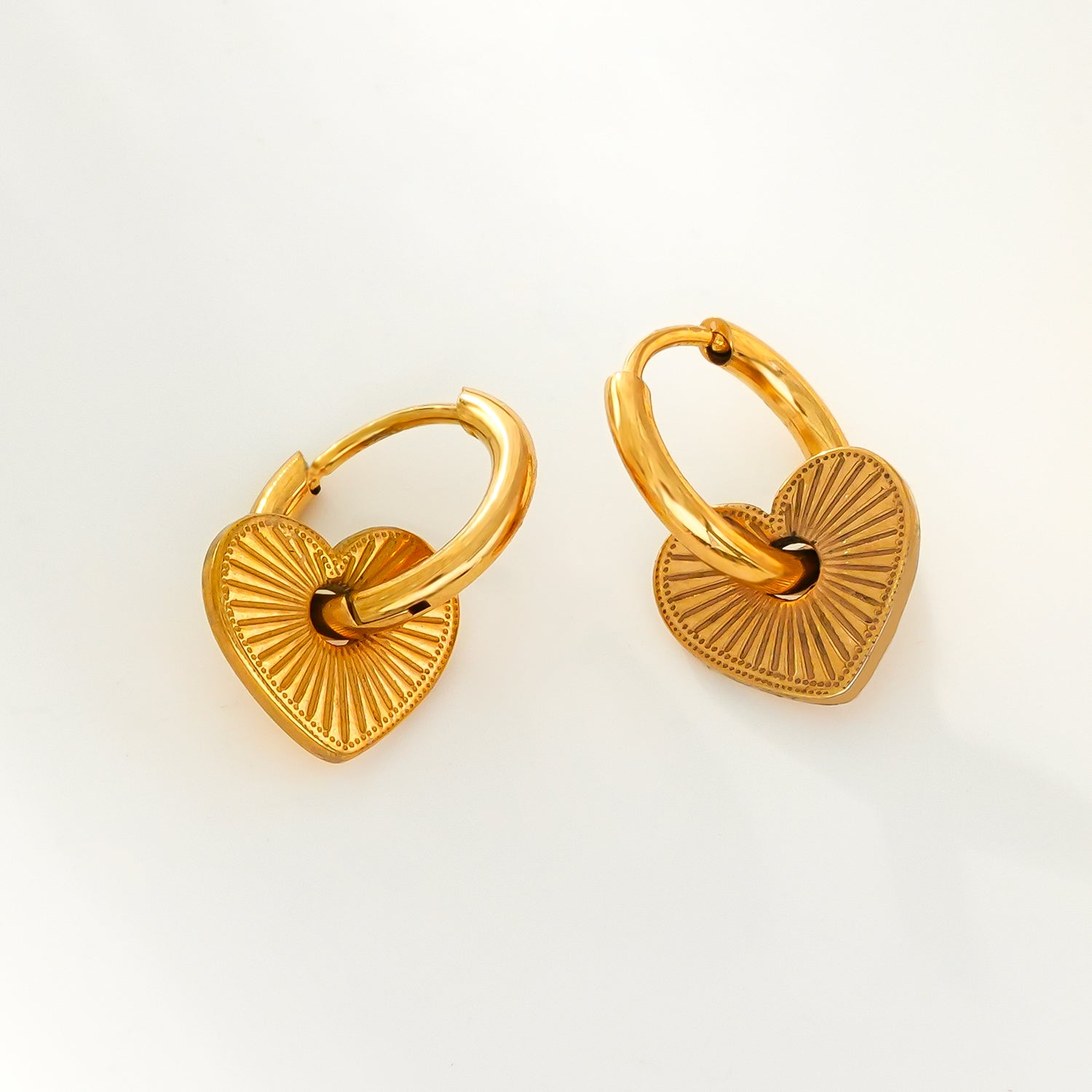 ENDEAR Gold: Romantic Heart Charm Hoop Earrings – A Symbol of Everlasting Love. - Velora Luxury Fashion