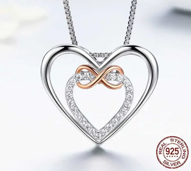 Entwined Hearts: Sterling Silver Infinity Necklace With Double Hearts - Velora Luxury Fashion