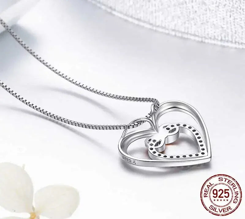 Entwined Hearts: Sterling Silver Infinity Necklace With Double Hearts - Velora Luxury Fashion