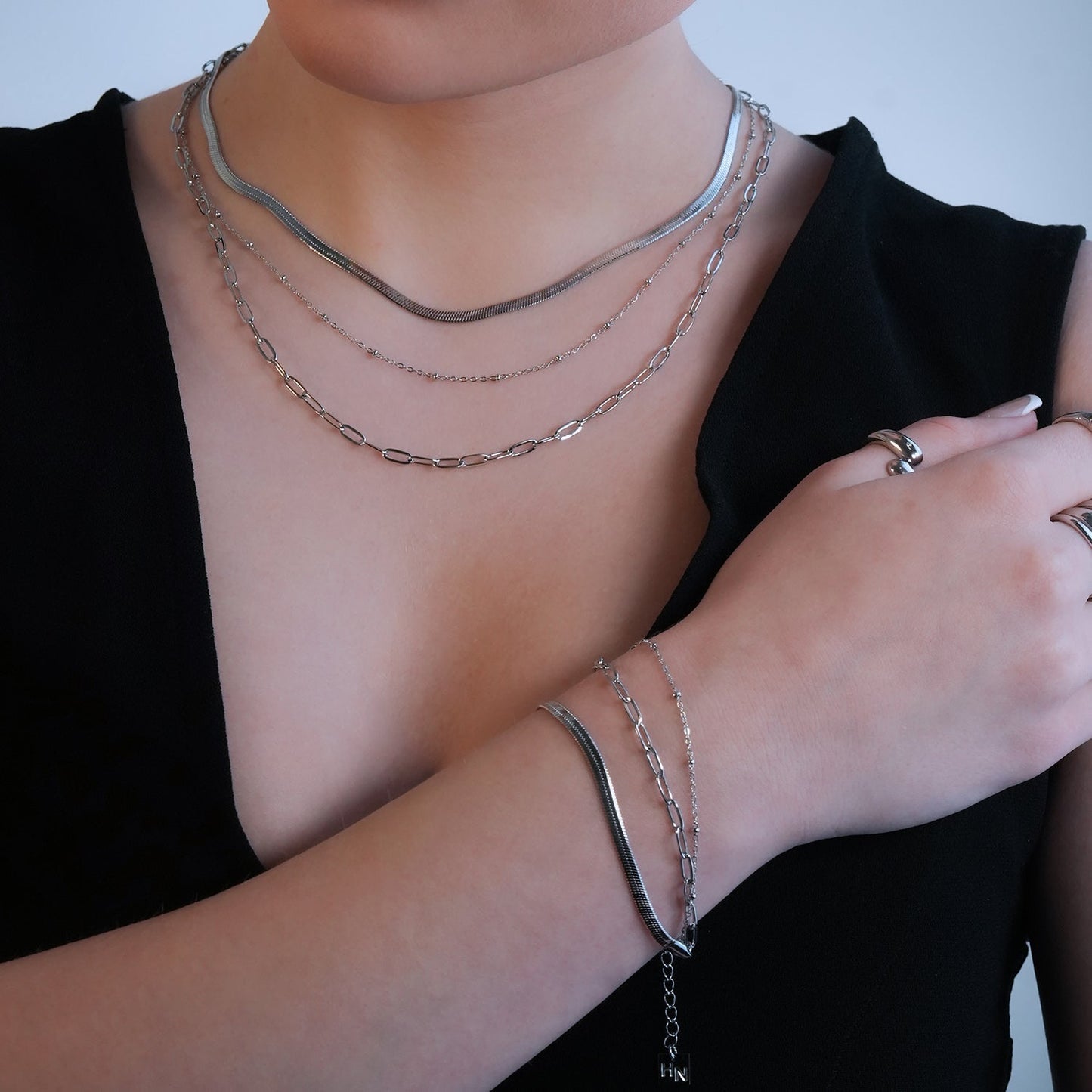 GEILNAR:  Triple Layer Mixed-Chain Necklace in Silver - Velora Luxury Fashion