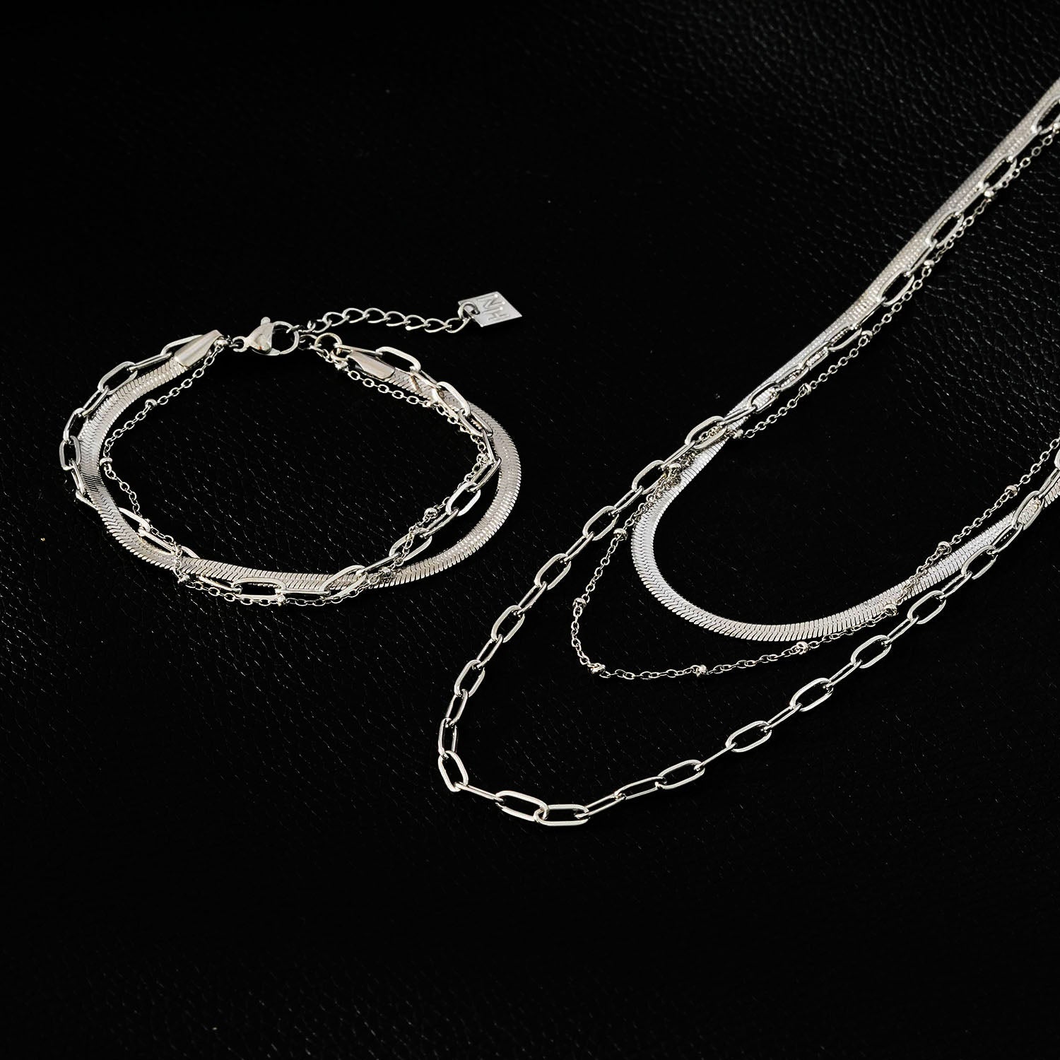 GEILNAR:  Triple Layer Mixed-Chain Necklace in Silver - Velora Luxury Fashion