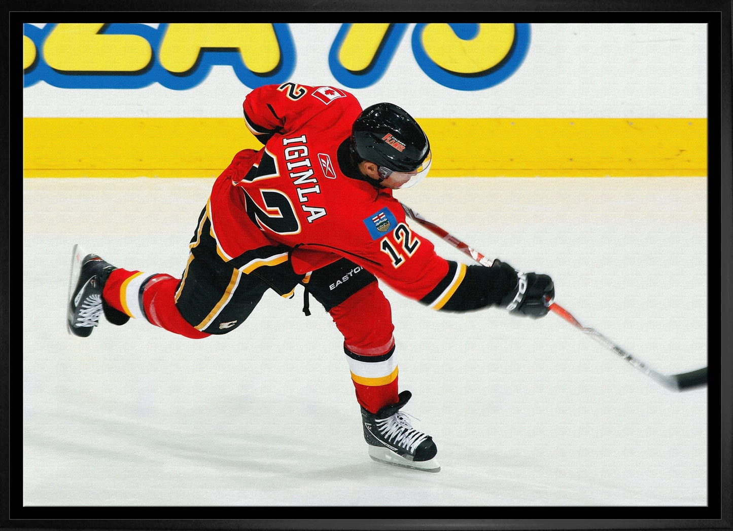 Jarome Iginla 20x29 Framed Canvas Flames Shooting-H - Velora Luxury Fashion