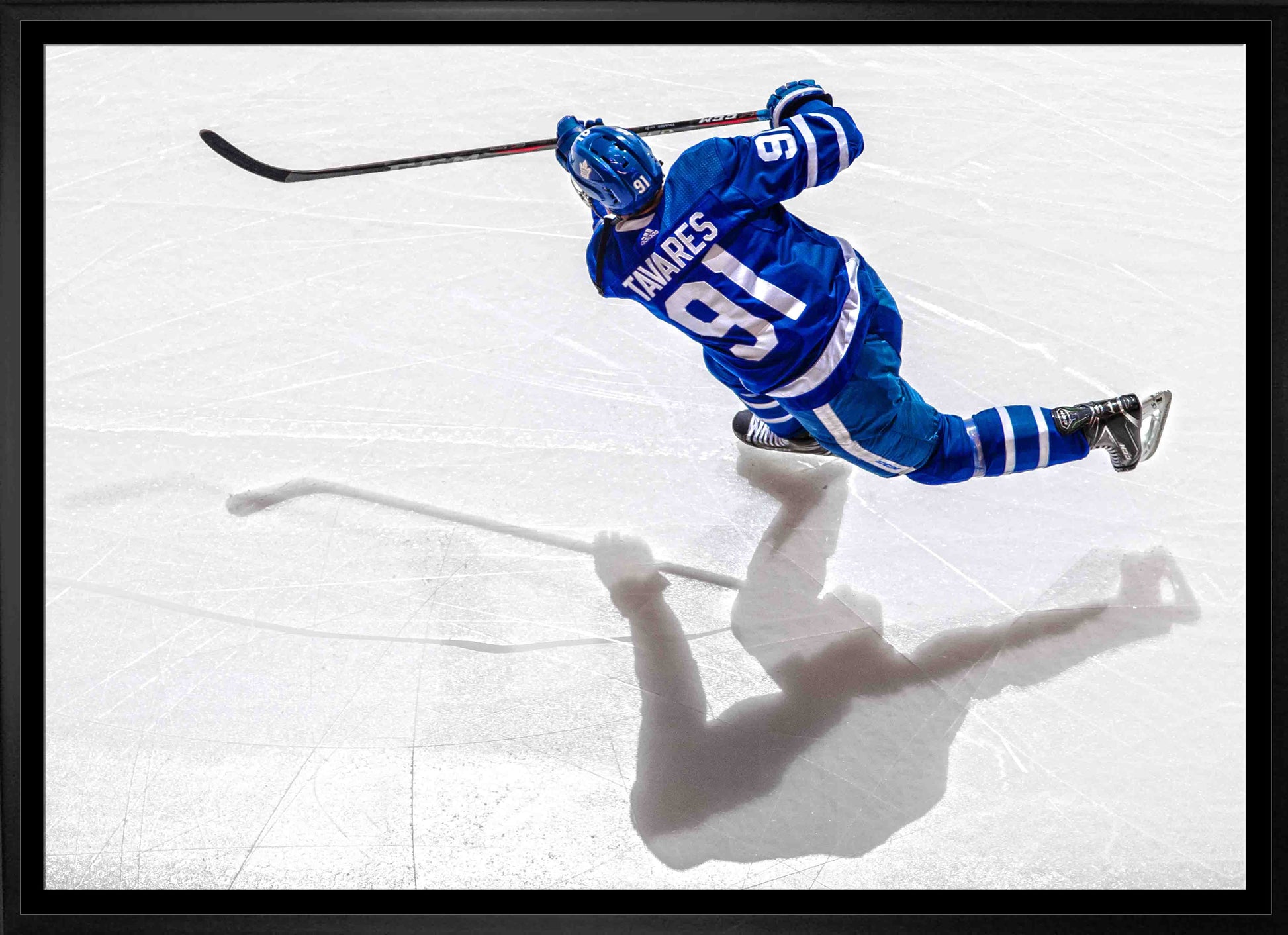 John Tavares Toronto Maple Leafs Framed 20x29 Shooting Canvas - Velora Luxury Fashion