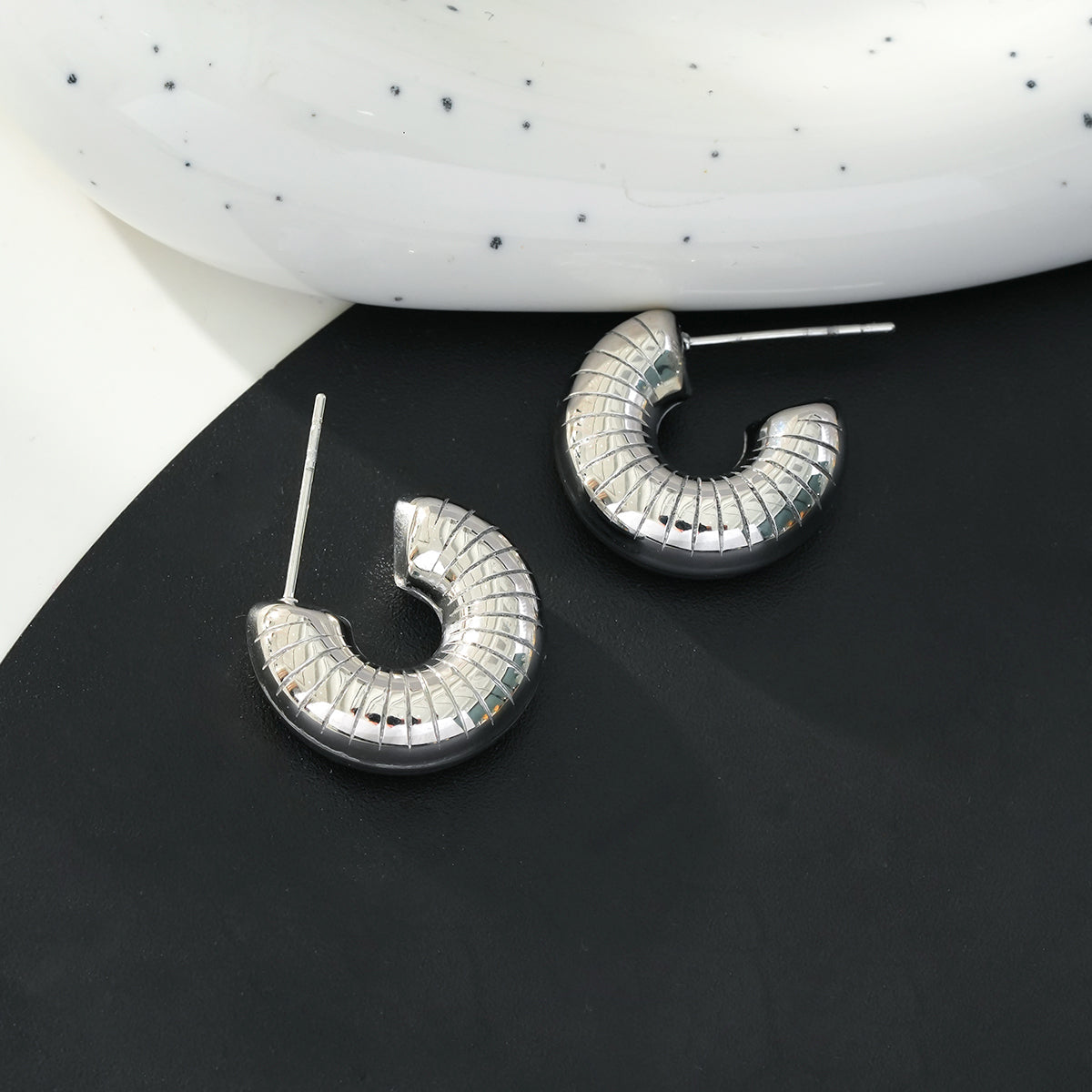 KOTOHIRA: Hollow Chunky-Look Textured Surface Tube Hoop Earrings in Silver Toned White Gold - Velora Luxury Fashion