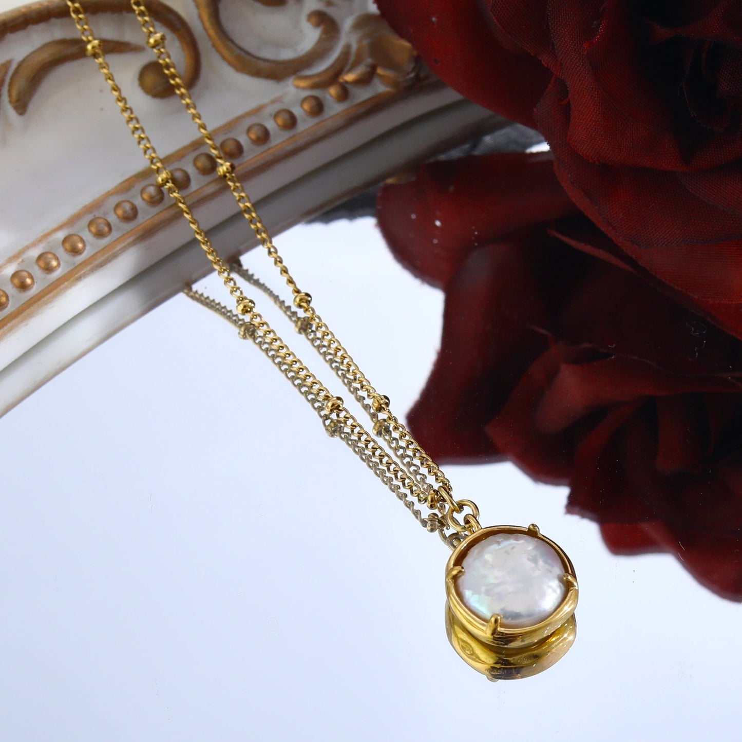 LERATI: Beaded Chain with an Encased Fresh Water Pearl Pendant in Gold - Velora Luxury Fashion