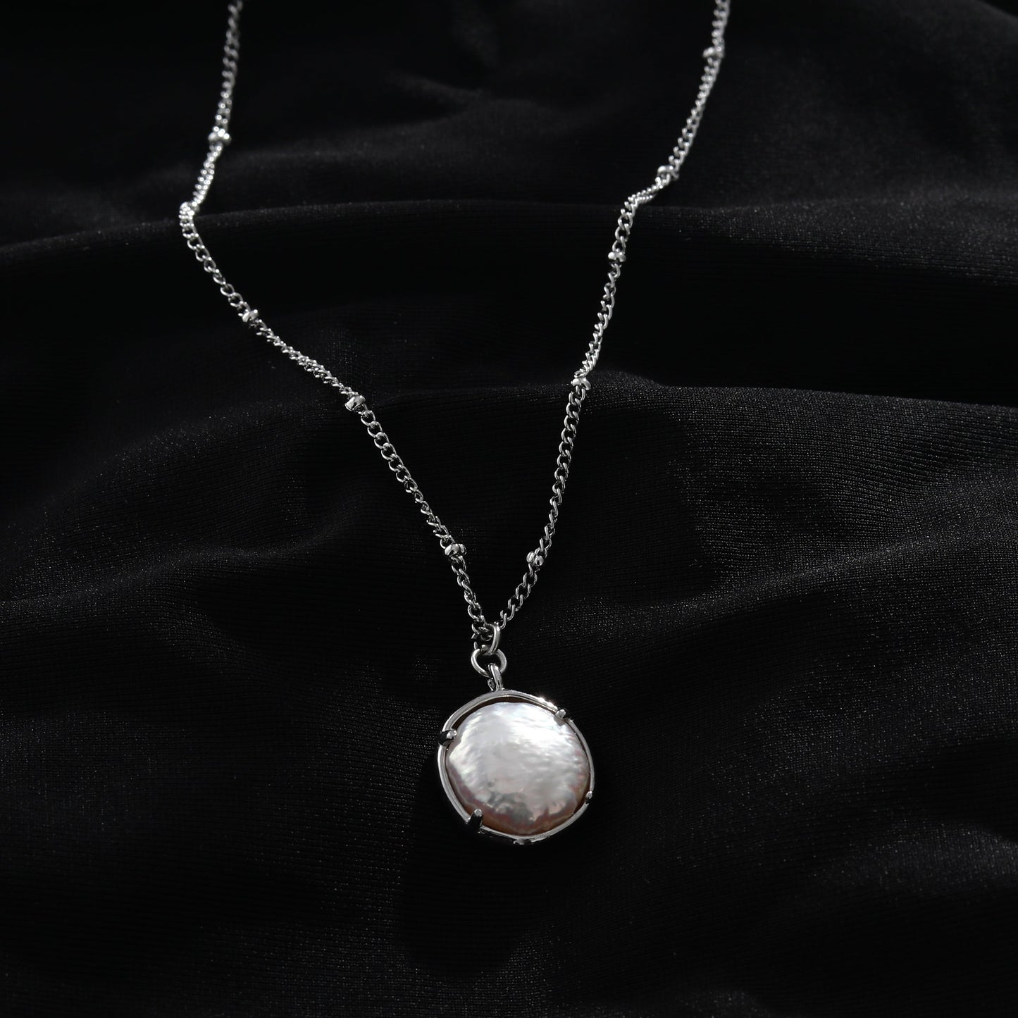 LERATI Beaded Chain with an Encased Fresh Water Pearl Pendant in Silver - Velora Luxury Fashion