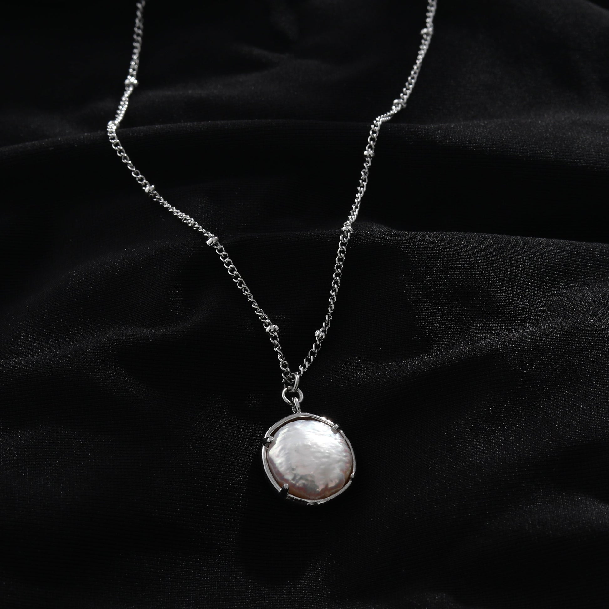 LERATI Beaded Chain with an Encased Fresh Water Pearl Pendant in Silver - Velora Luxury Fashion