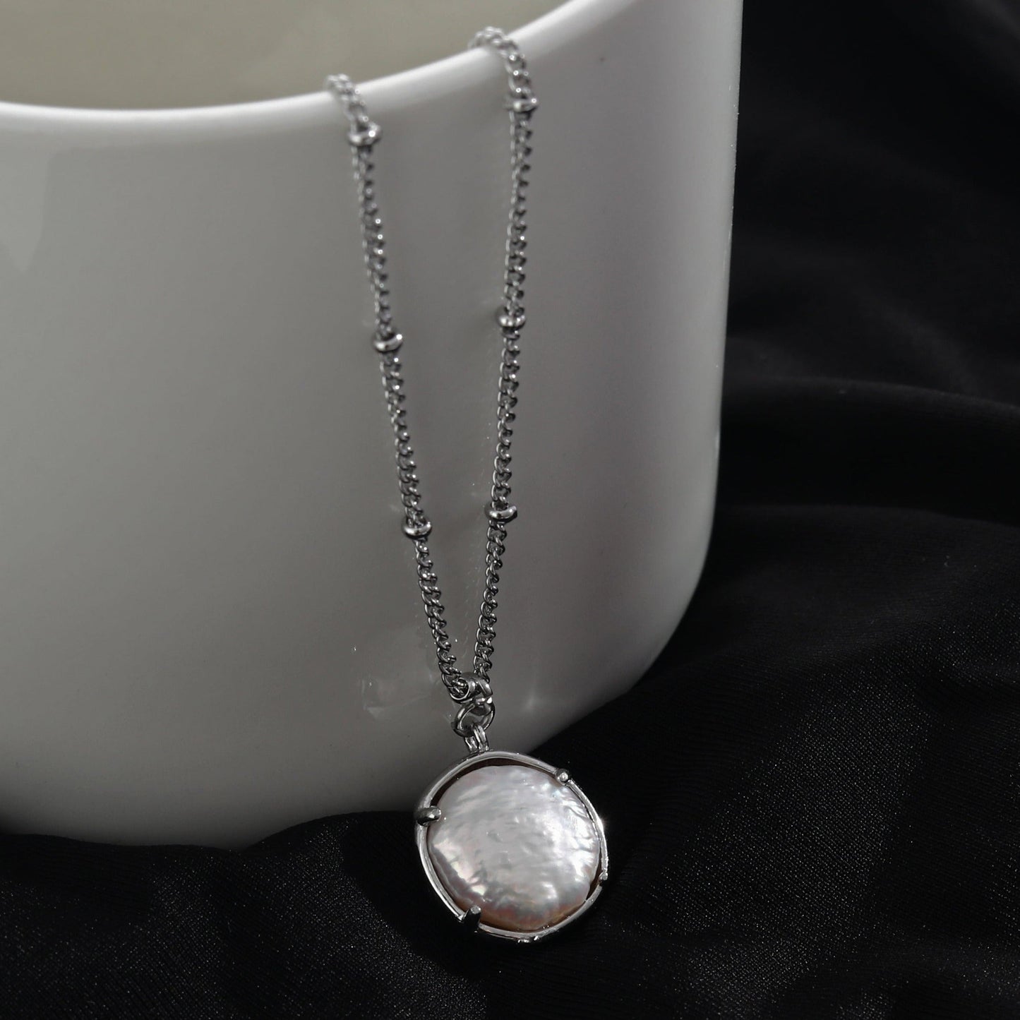 LERATI Beaded Chain with an Encased Fresh Water Pearl Pendant in Silver - Velora Luxury Fashion