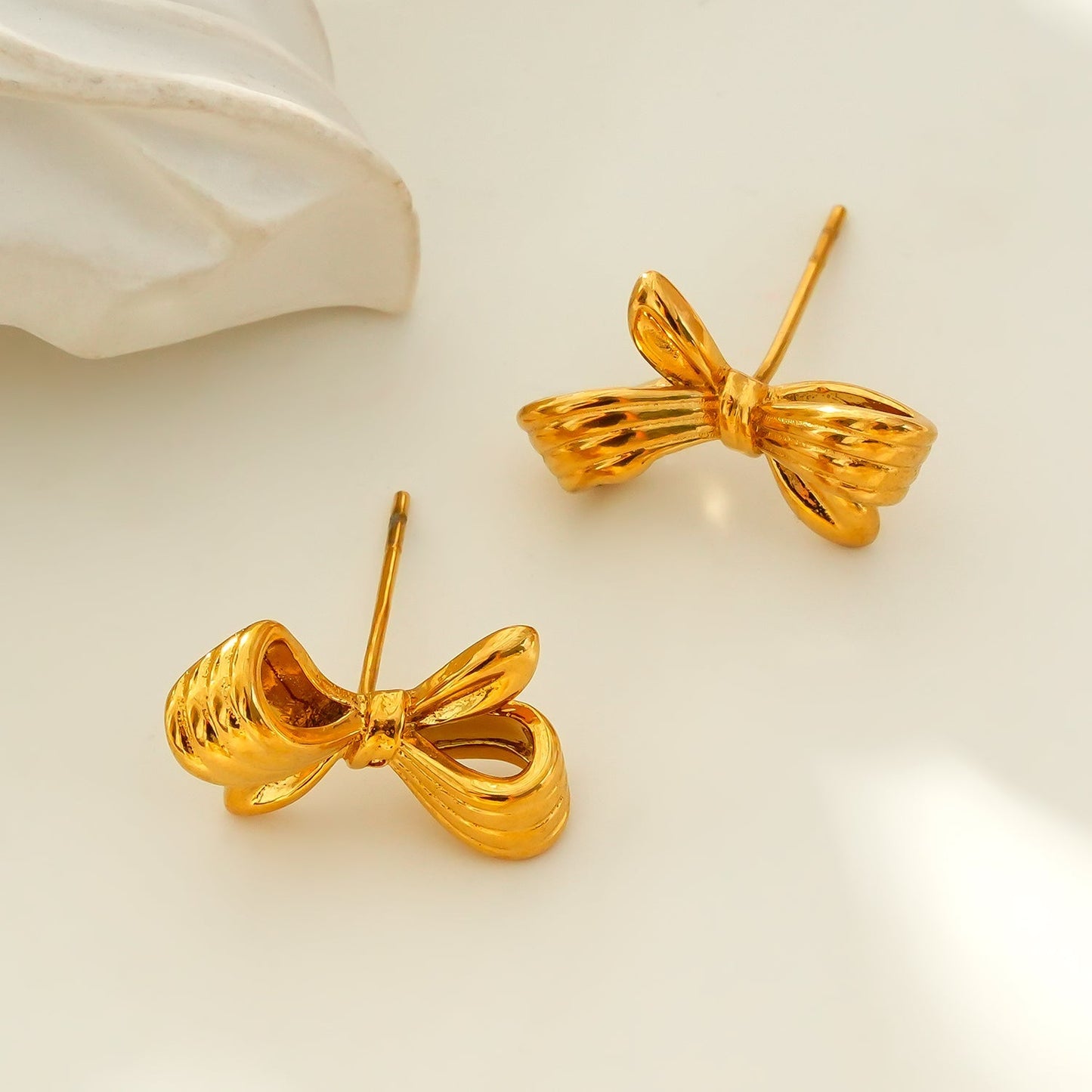 MISTY: Mini Bow Shaped Stud Earrings in Gold - Velora Luxury Fashion