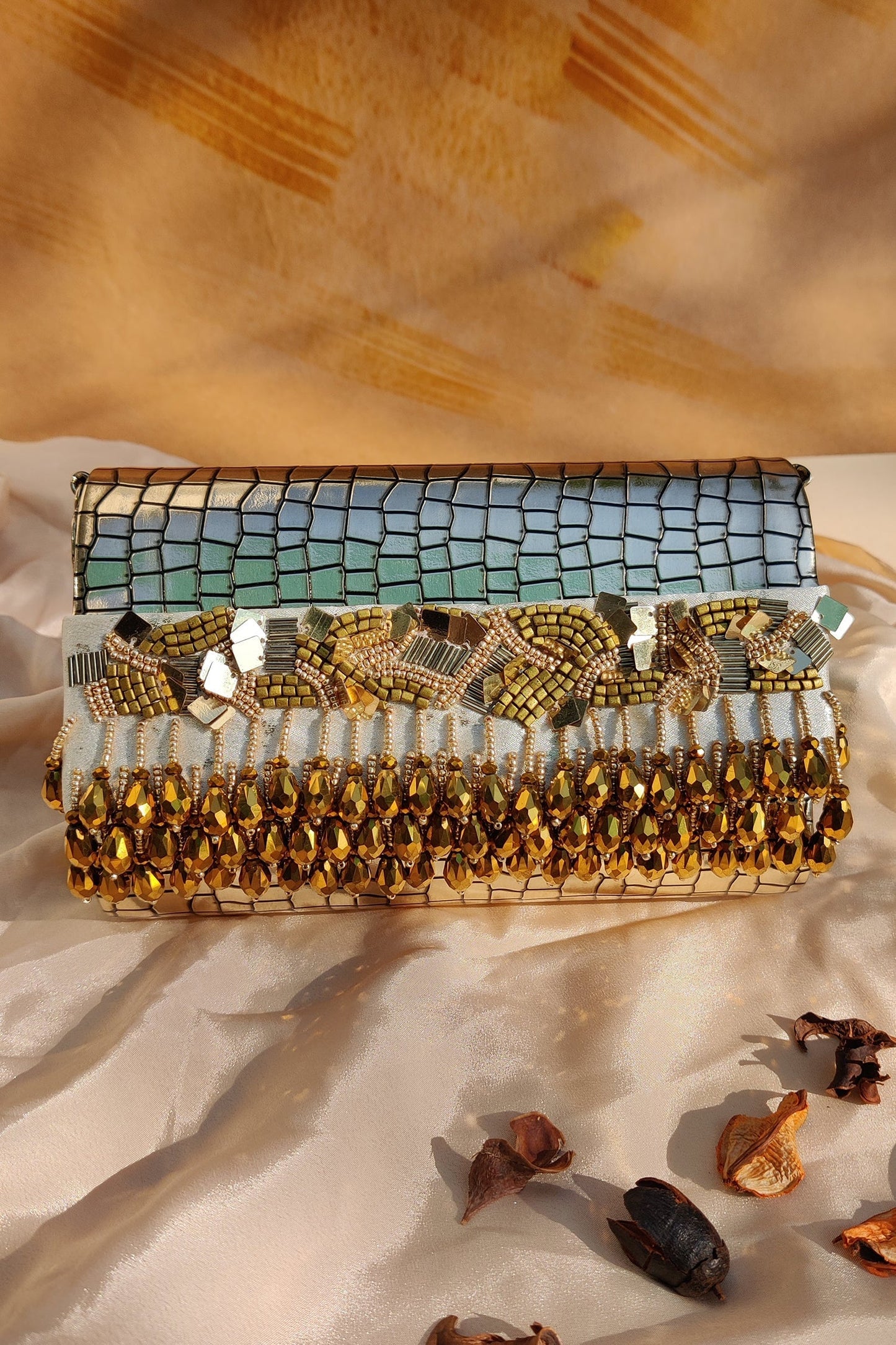 NOORIE GOLD HANDHELD CLUTCH - Velora Luxury Fashion