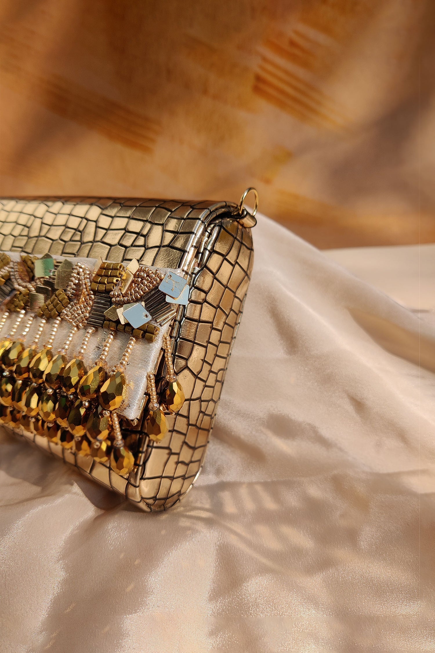NOORIE GOLD HANDHELD CLUTCH - Velora Luxury Fashion