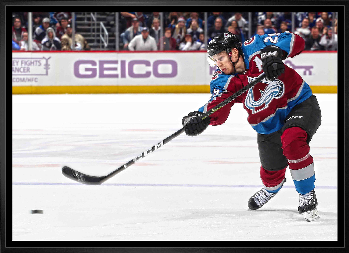 Nathan MacKinnon Colorado Avalanche Framed 20x29 Shooting Canvas - Velora Luxury Fashion