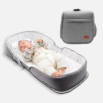 Foldable Newborn Baby Crib – Portable Travel Cot with Mosquito Net & Cotton Cushion