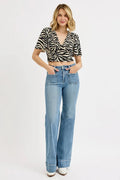RISEN Full Size High Rise Wide Flare Patch Pocket Jeans Plus Size - Velora Luxury Fashion