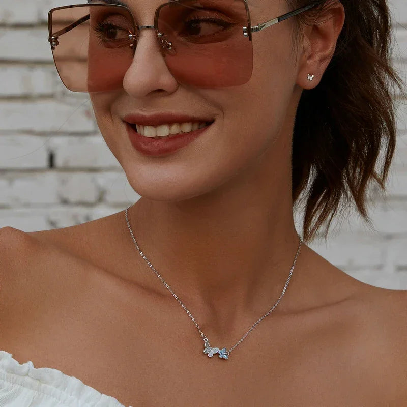 Soar with Style: Blue Zircon Korean Style Sterling Silver Butterfly Necklace - Velora Luxury Fashion
