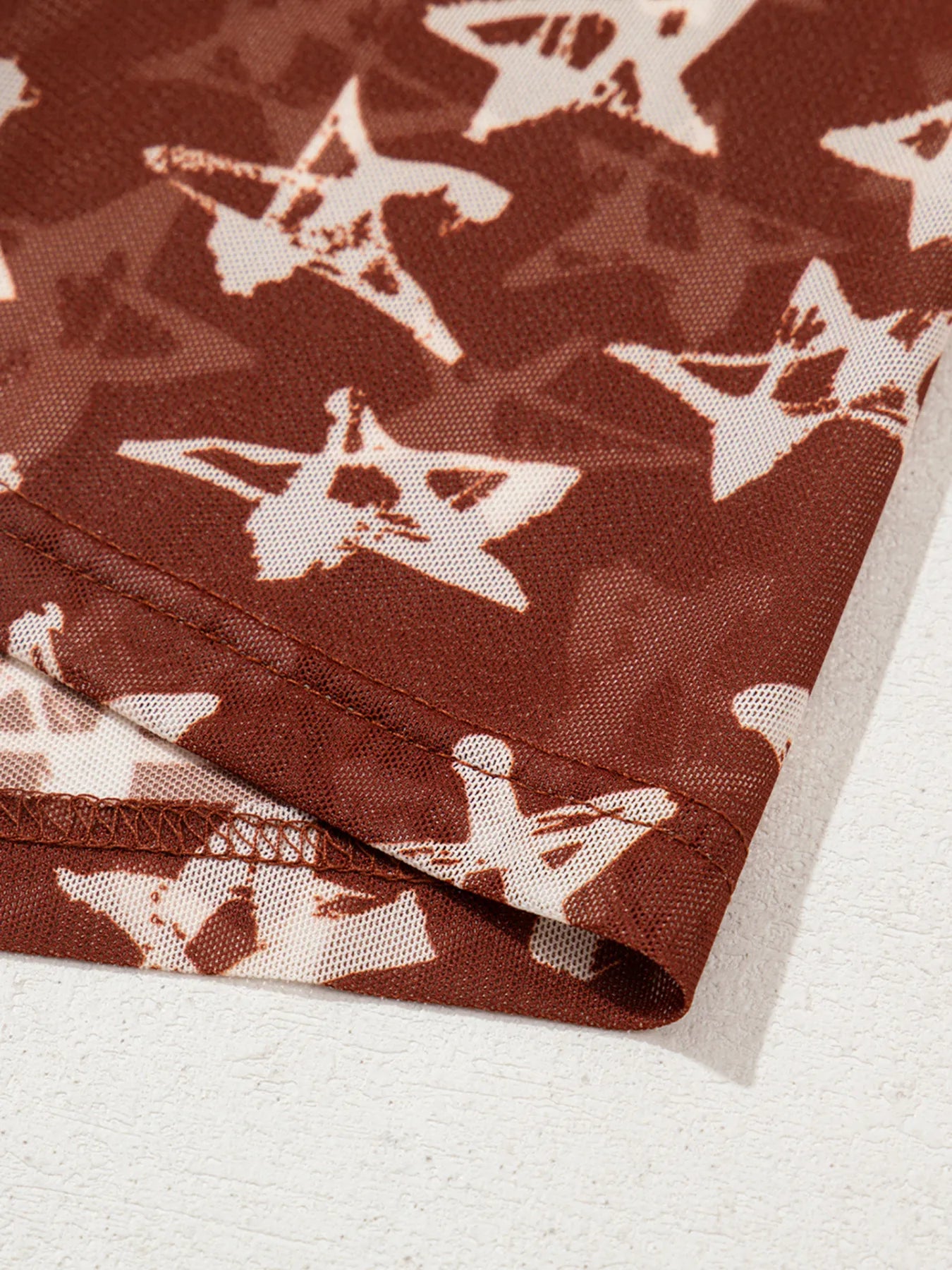 Star Print Long Sleeve Mock Neck Top - Velora Luxury Fashion