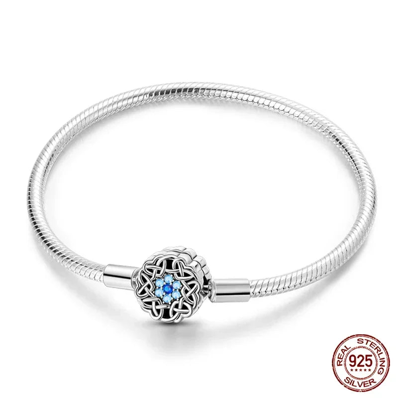 Sterling Silver Celtic Snowflake Charm Bracelet with Blue CZ - Velora Luxury Fashion