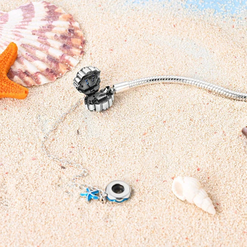 Sterling Silver Seashell Charm Bracelet with Blue CZ Gradient - Velora Luxury Fashion