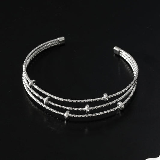 Style FARZIKA Silver: Triple Stacked Textured Beaded Bracelet - Velora Luxury Fashion