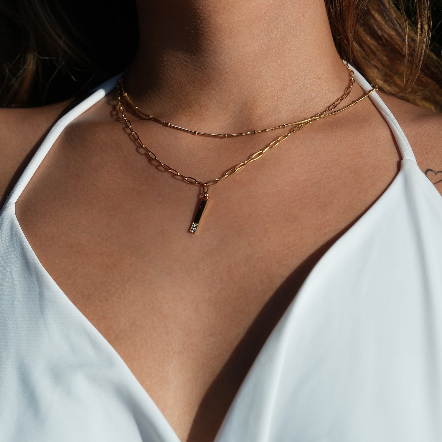 Style KORATIA: Minimalist Necklace with Paper-Clip Chain and Bar Charm Zirconia Embedded Pendant in Gold - Velora Luxury Fashion