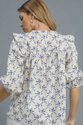 Umgee Ruffled Bow Print Notched Blouse - Velora Luxury Fashion