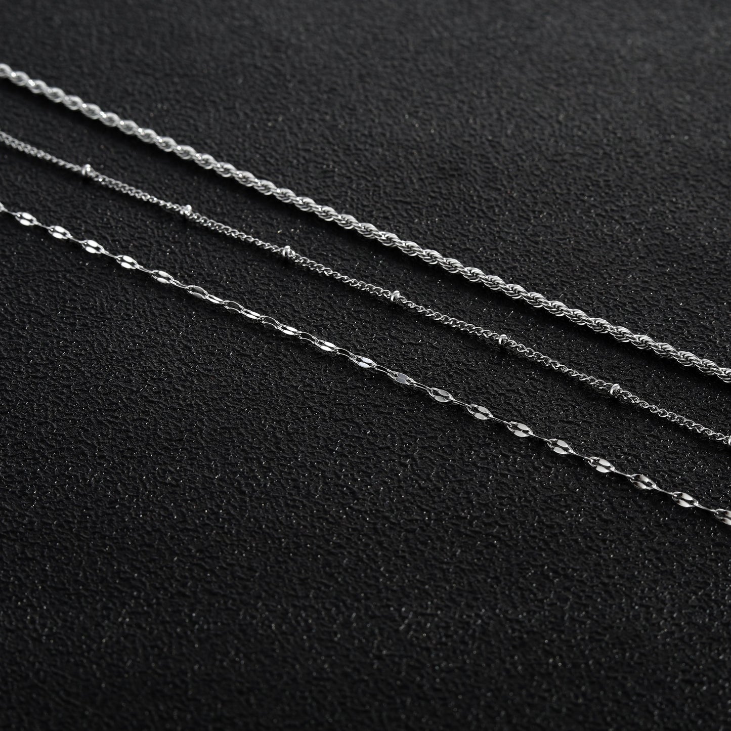 ZURI Triple Layer Mixed-Chain Necklace in Silver - Velora Luxury Fashion